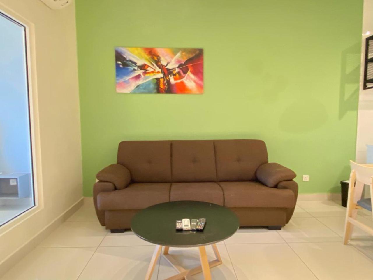 Aparthotel Arte Mont Kiara Kuala Lumpur Zewnętrze zdjęcie A living room with a sofa